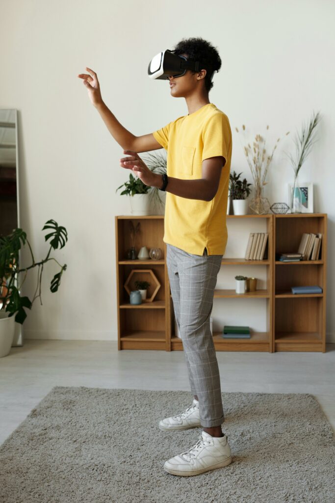 A boy playing on a VR headset